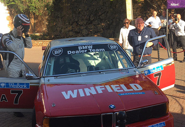 Former Hollard-CEO and ITOO-Chairman Paolo Cavalieri standing next to a classic racing BMW.