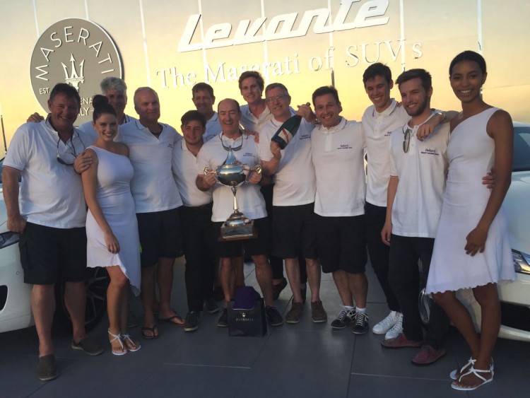The Hollard Jacana crew gathered together with their trophy