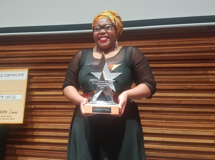 The Insurance Apprentice 2017 winner Kabelo Paile, with her trophy.