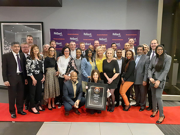 The Hollard Insure Team proudly gathered around the FIA 2019 Corporate Short-term Insurer of the Year Award 2019