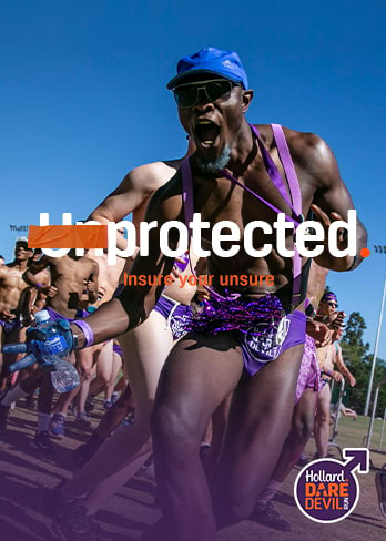 Hollard Daredevil Run participant in a purple Speedo posing for the camera