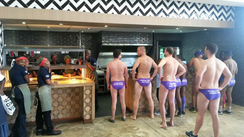#DareDevilRun2016 participants in purple speedo's at Nando’s Central Kitchen