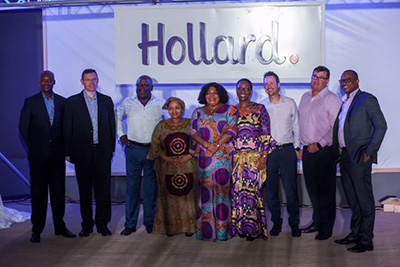 The Hollard Insurance Ghana Limited team gathered on stage, smiling
