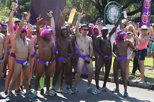 Daredevil Run competitors waiting at the starting-line in their purple speedos.
